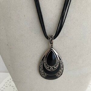 Black Silver Oval Medallion on Black Faux Leather Cord